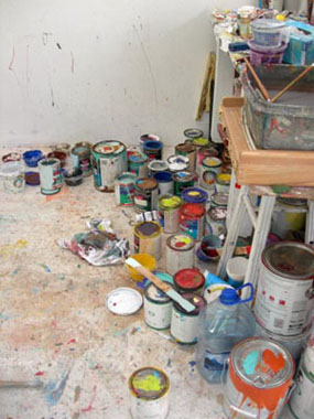 paint pots and brushes in Beth Amine's Studio